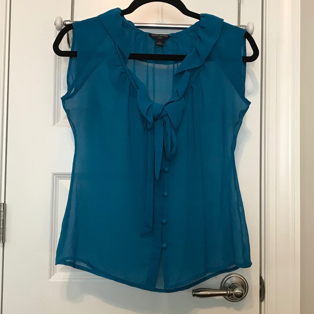 Banana Republic transparent teal sleeveless blouse, ruffled bow neckline (PS)